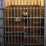 Solitary confinement and Bible in prison cell